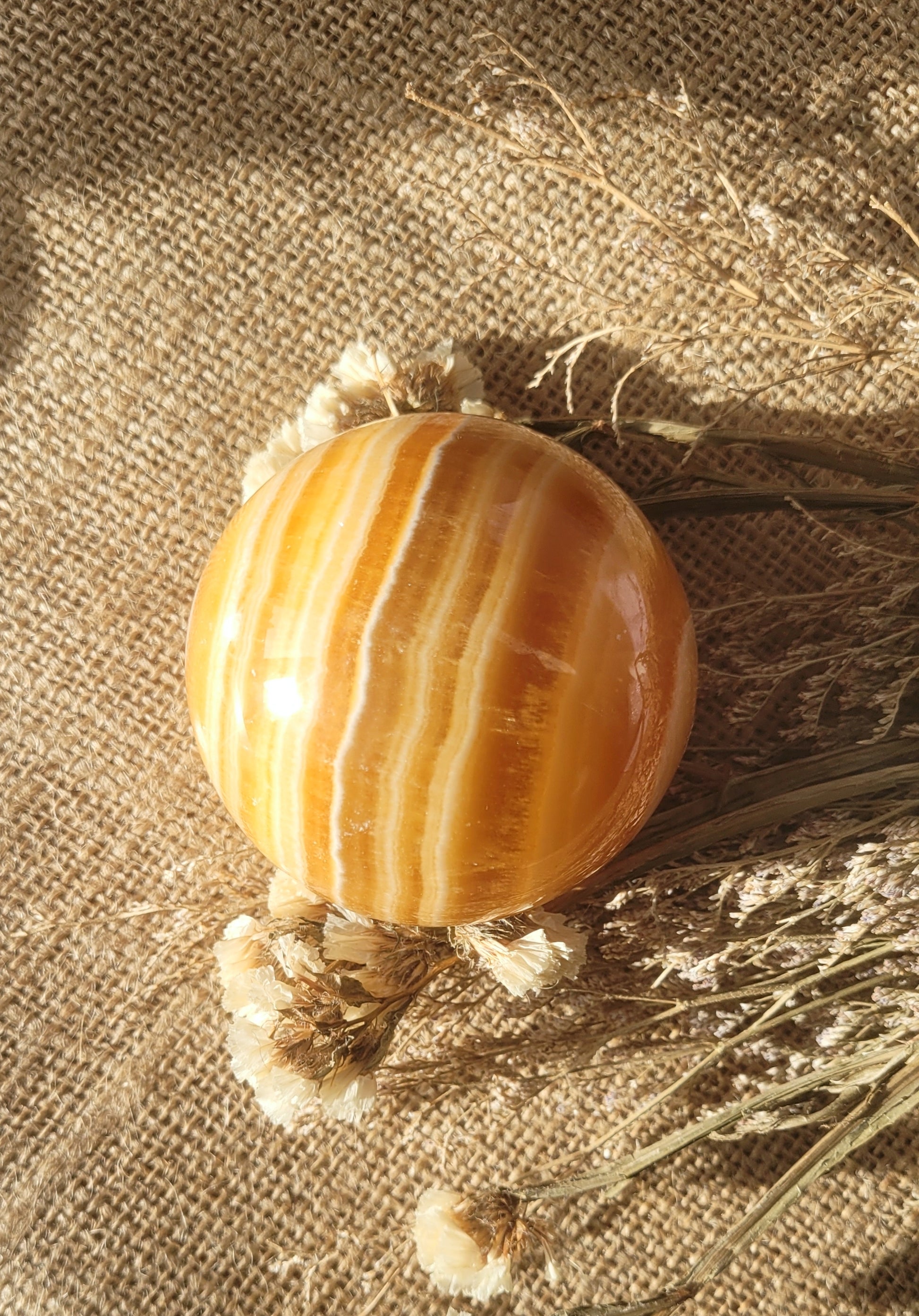 Natural orange calcite sphere // with stand