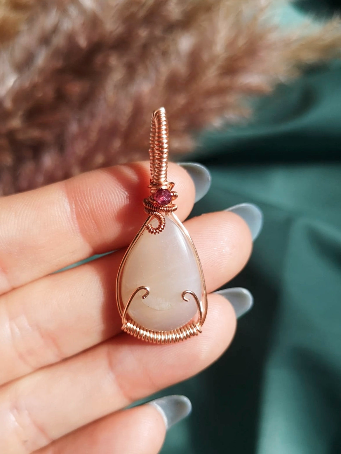 Natural moonstone/ garnet hand wrapped copper pendant