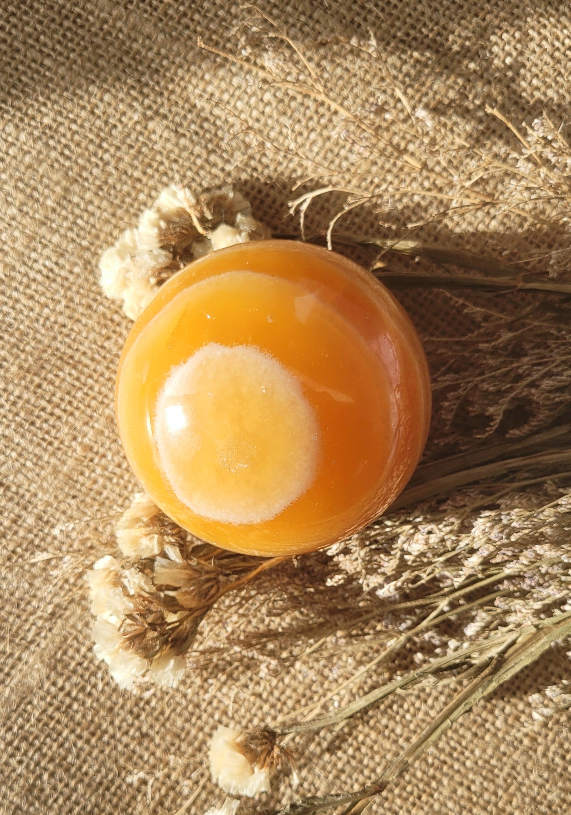 Natural orange calcite sphere // with stand